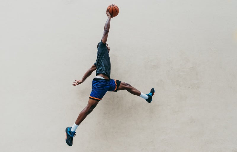 Basketball player dunking