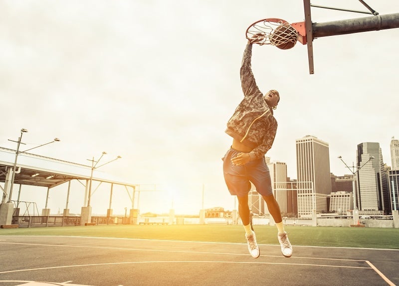 basketball player dunking